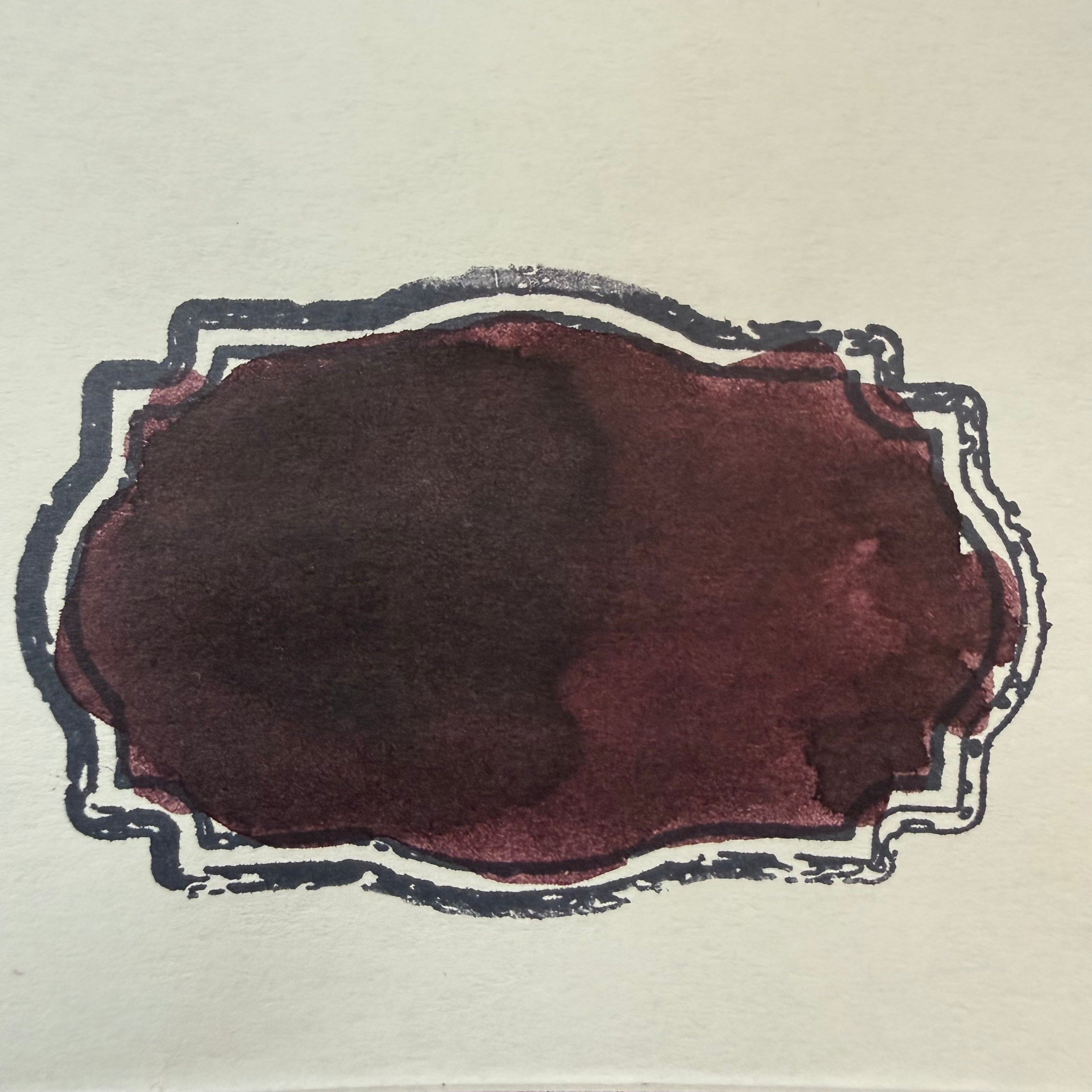 Swatch of 01 Boston Lore fountain pen ink showing deep burgundy-brown and blackened wine tones
