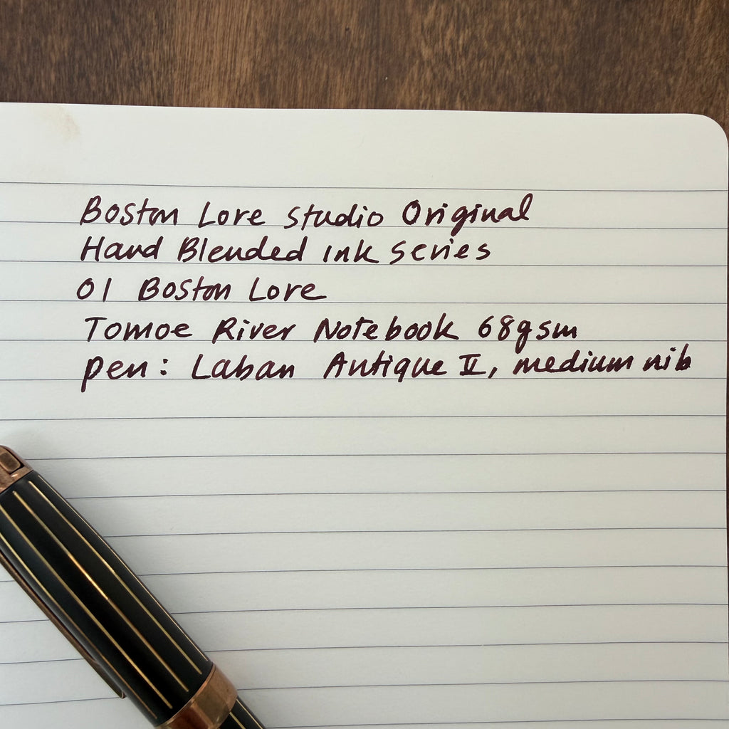 Detailed handwriting sample showing the dark burgundy-brown tones of 01 Boston Lore fountain pen ink