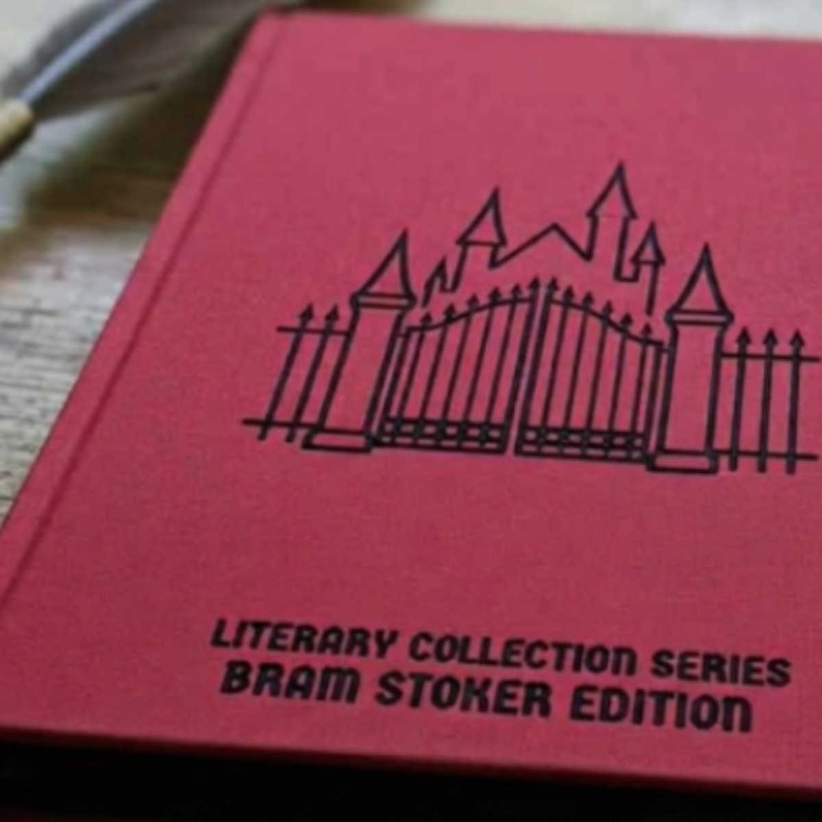 Close-up of the red Bram Stoker Edition notebook cover with black foil castle gate and Literary Collection Series lettering