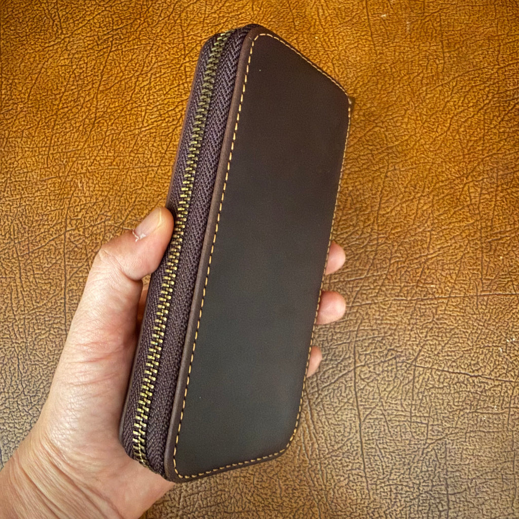 Side view of Coffee brown leather zippered 3-pen fountain pen case