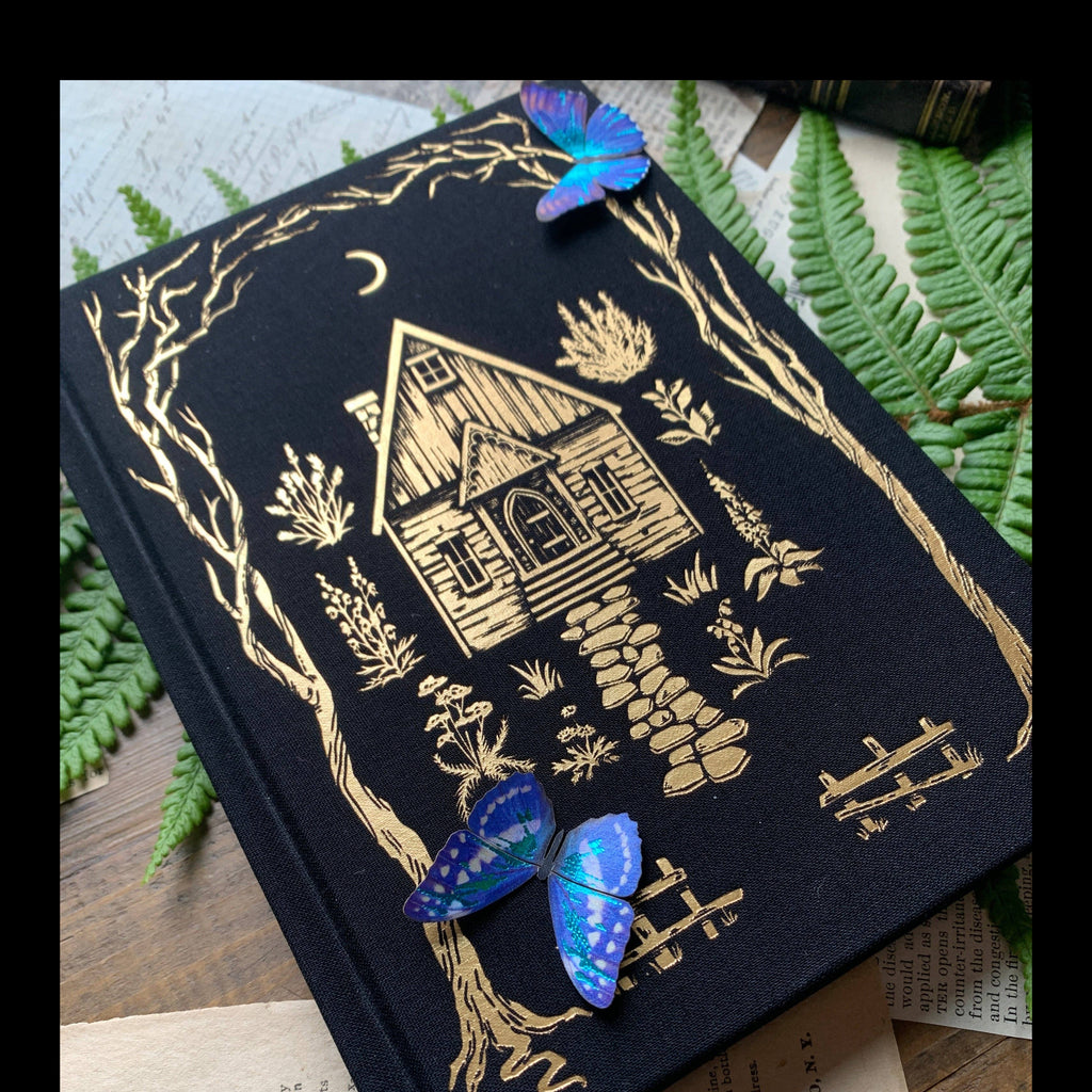 The Creeping Moon The Grimoire B6 notebook with black linen cover and gold foil design