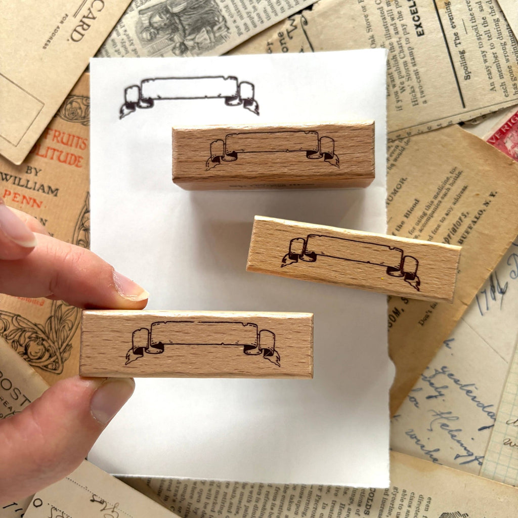 Scroll banner stamp impression by The Creeping Moon