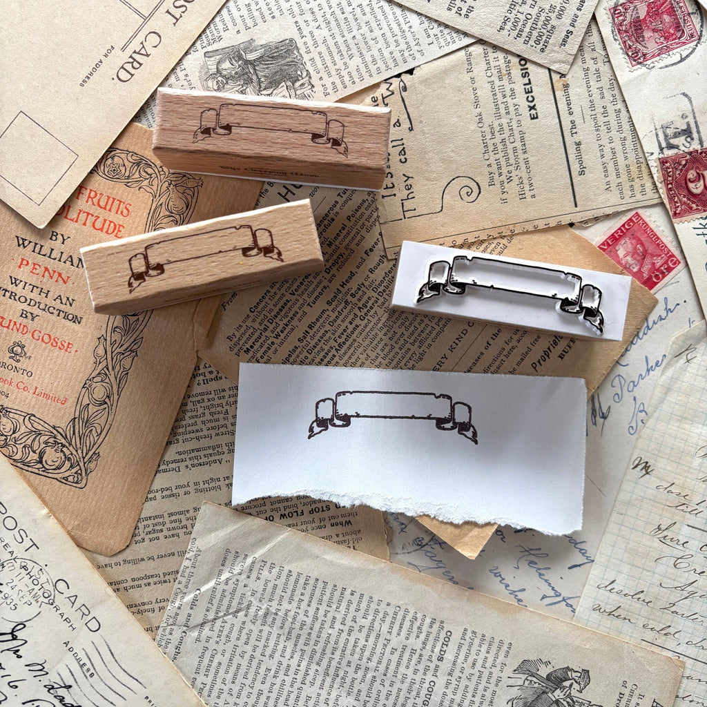 The Creeping Moon Scroll Banner rubber stamp shown in use