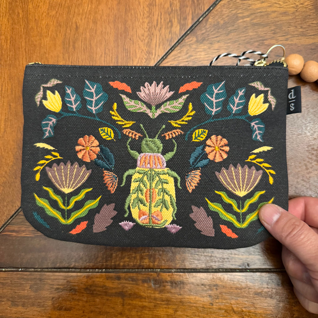 Danica Studio Amulet Small Zipper Pouch shown in hand for scale