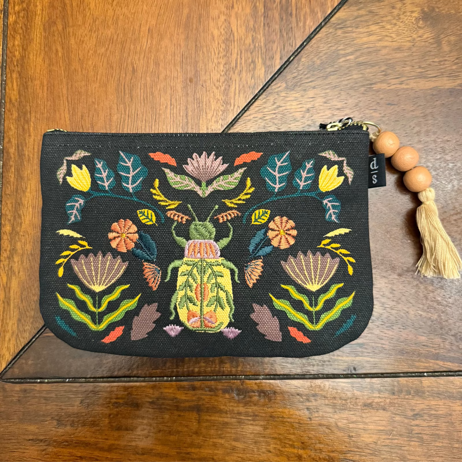 Danica Studio Amulet Small Zipper Pouch showing zipper and beaded tassel detail