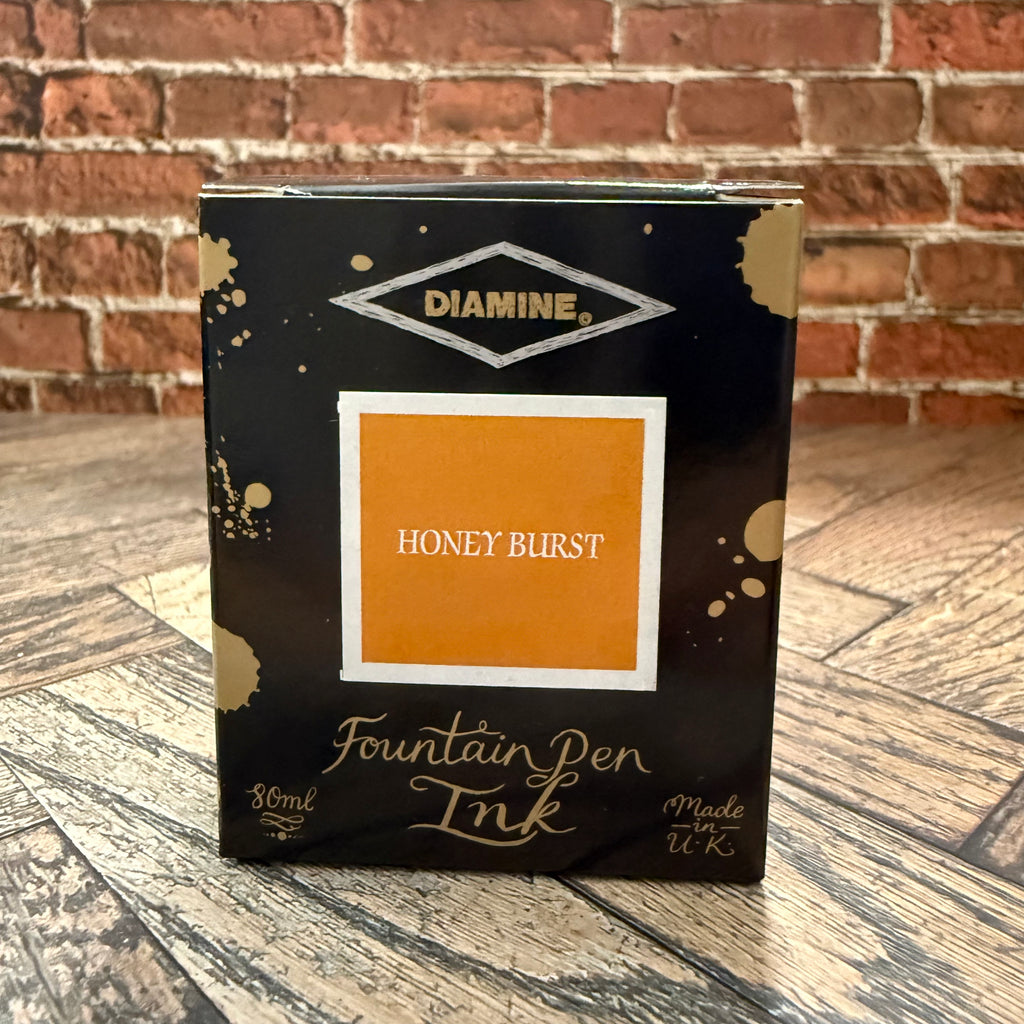 Diamine Honey Burst 80 mL fountain pen ink box, black with gold ink splashes