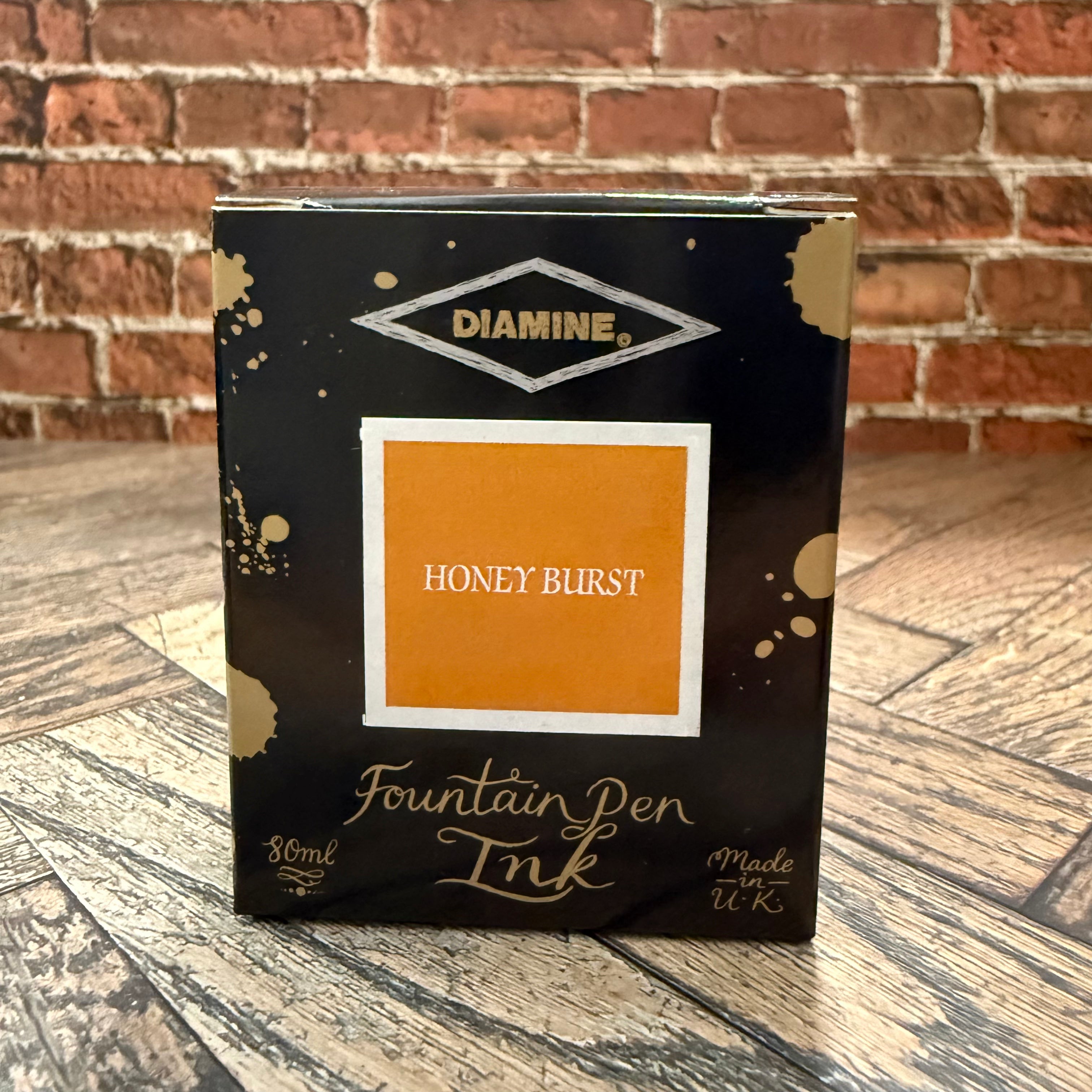 Diamine Honey Burst 80 mL fountain pen ink box, black with gold ink splashes