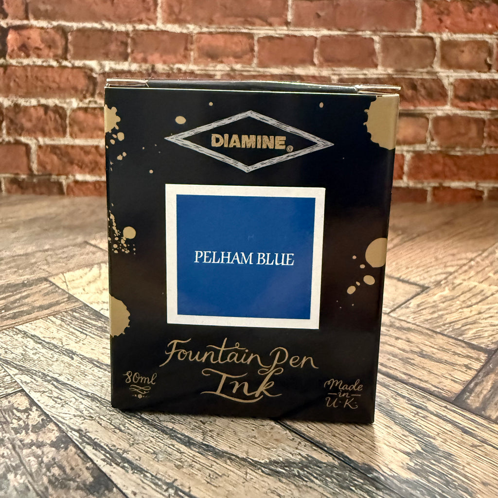 Diamine Pelham Blue 80 mL fountain pen ink box, black with gold ink splashes