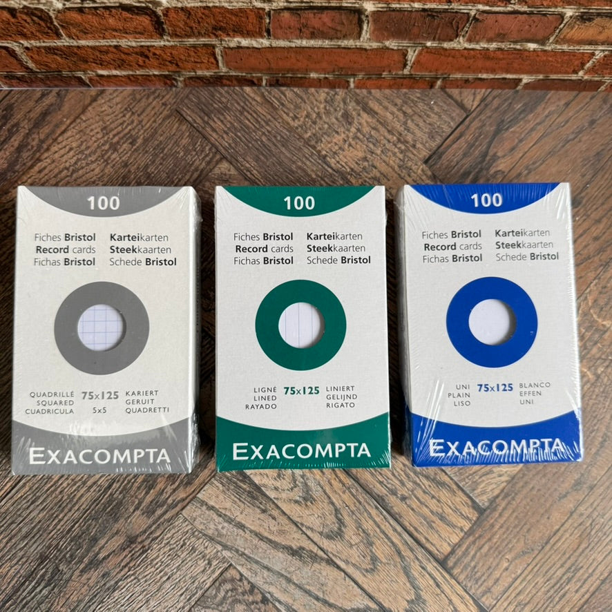 Three packs of Exacompta Bristol record cards, 75 x 125 mm: grey 5 mm squared, green lined and blue plain