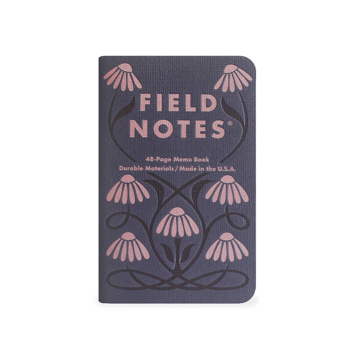 Field Notes Fall Flowers pocket notebook with a pink coneflower letterpress pattern on a dark cover