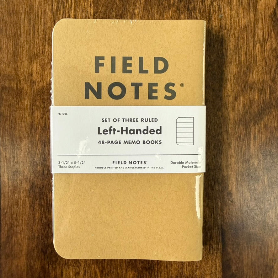 Field Notes Left-Handed ruled pocket notebooks three-pack, showing the kraft front cover and sleeve labeled 48-page memo books
