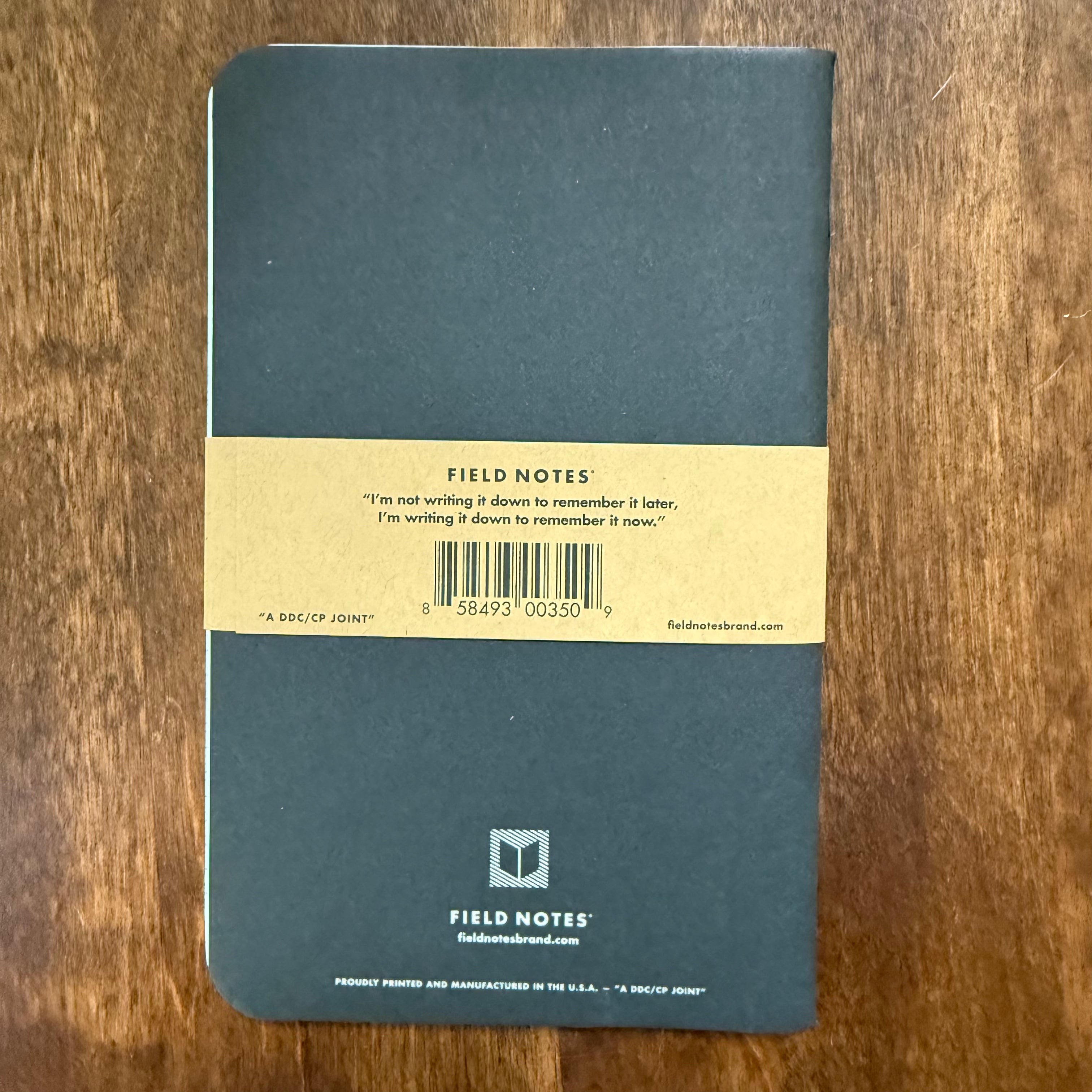 Back of Field Notes Pitch Black Dot-Graph 3-Pack pocket notebooks showing product band and details