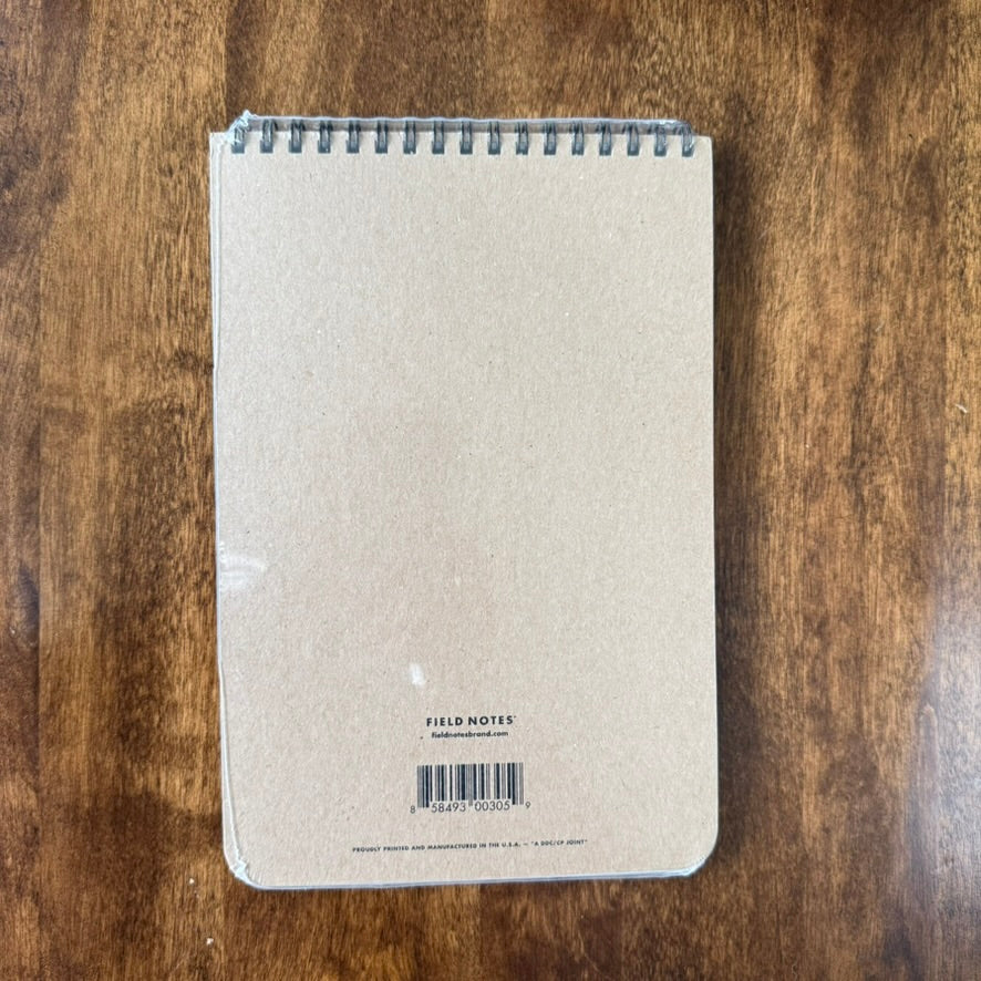 Back cover of the Field Notes Steno Book, showing its plain chipboard cover, top wire binding, and made-in-USA marking