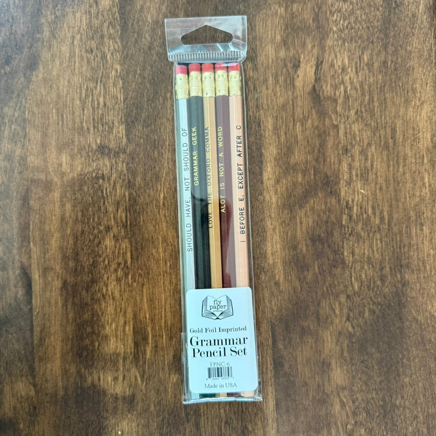 Fly Paper Products Grammar Pencil Set with five colorful literary pencils featuring humorous grammar rules and gold foil lettering.
