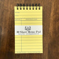 Vintage Library Card Memo Pad by Fly Paper Products with 30 spiral-bound sheets in a classic yellow library checkout card design.