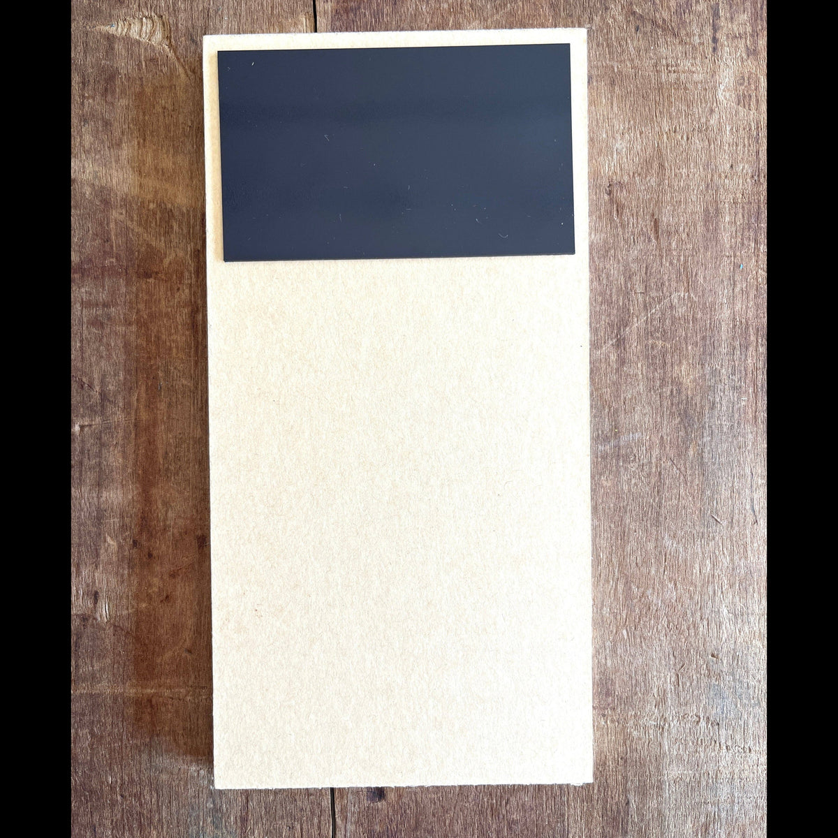 Magnetic back of Katharine Watson Navy Echinacea market pad