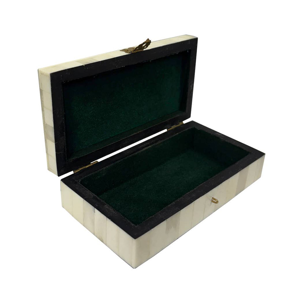 Open bone-inlay keepsake box showing its green felt-lined interior and hinged lid