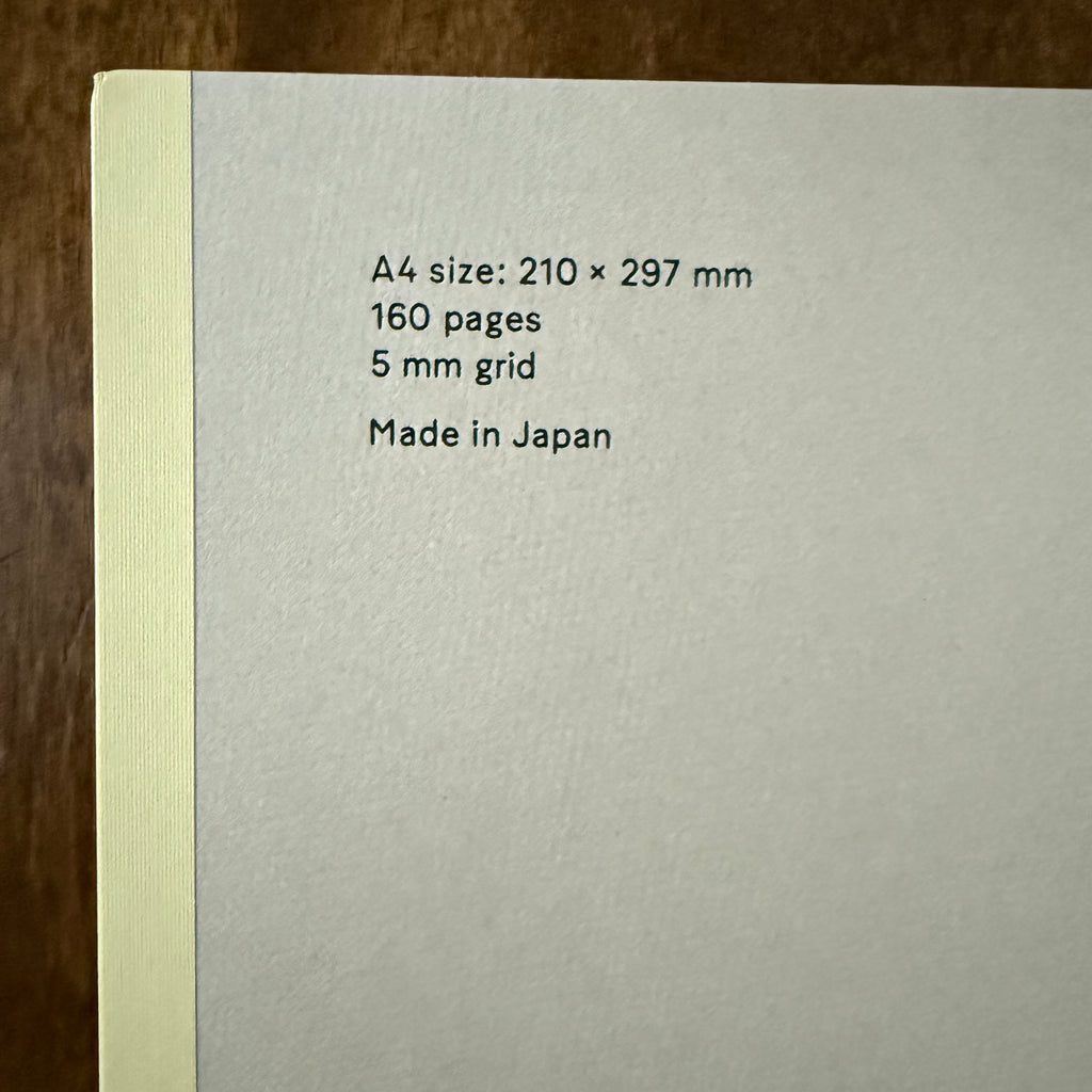 Close-up of the MARK’S EDiT A4 cover showing 210 × 297 mm dimensions, 160 pages, 5 mm grid, and Made in Japan text.