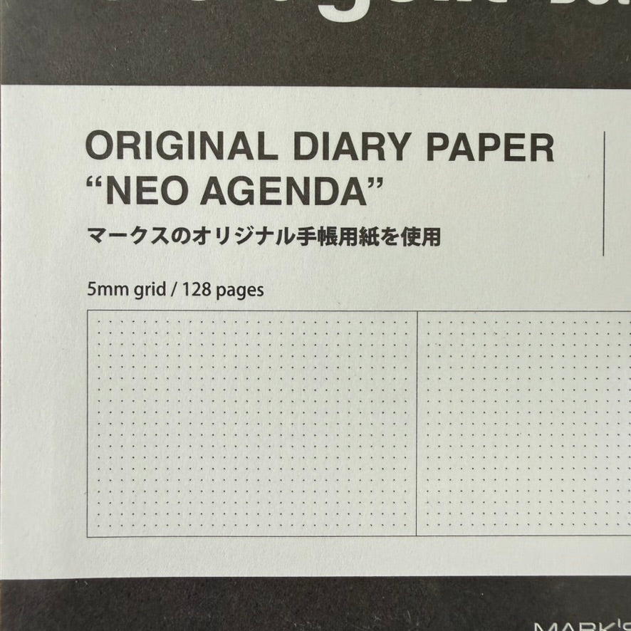 MARK'S Storage.it Desk refill packaging detail showing 128 pages, 5 mm dot grid, and a sample page spread