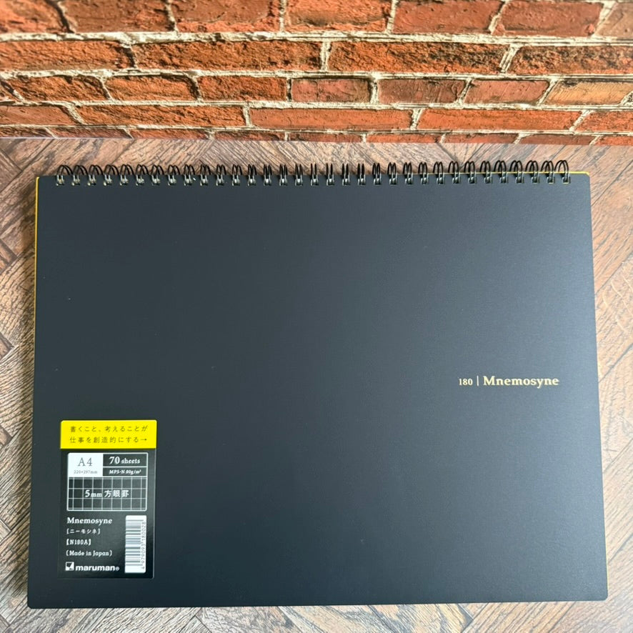 Maruman Mnemosyne 180 A4 landscape notebook with black cover, twin-wire binding and product label