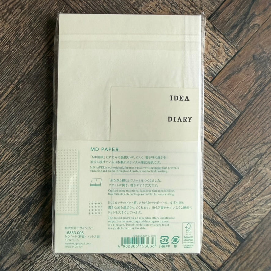 Back of the Midori MD B6 Slim dot grid notebook band describing MD Paper, threaded binding and 5 mm dot grid, made in Japan
