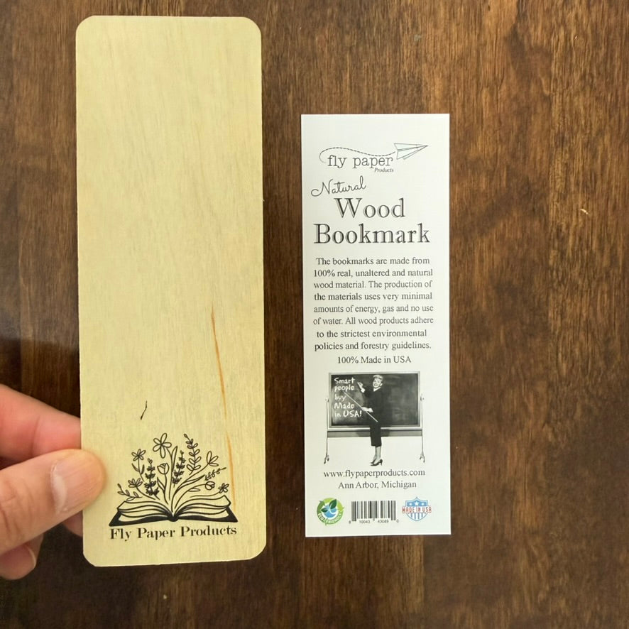 Back of natural wood bookmark showing unfinished wood grain and product card