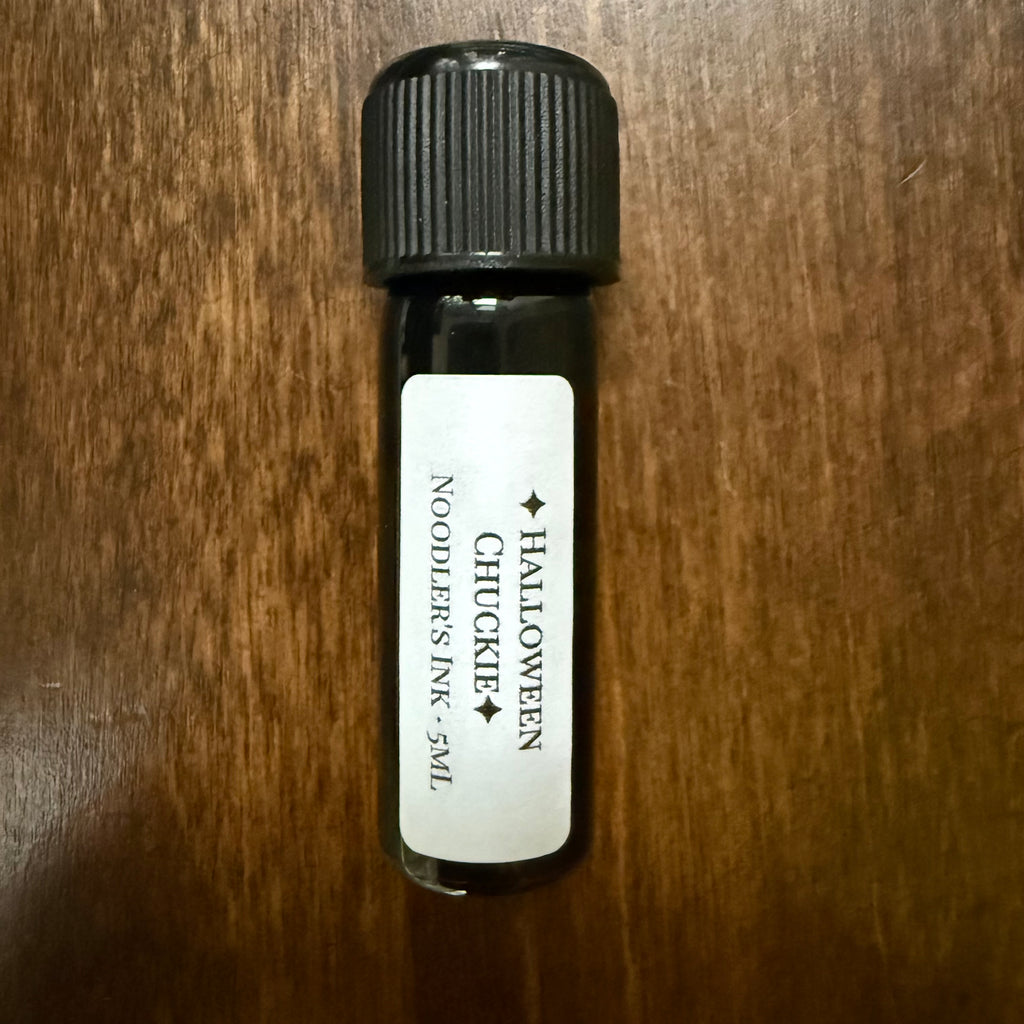 Noodler's Halloween Chuckie 5 mL Archive Bottle standing upright with its label