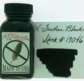 Noodler's X-Feather Black fountain pen ink bottle and writing sample
