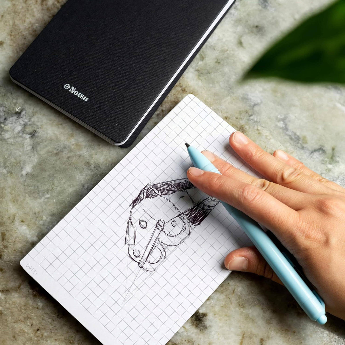 Notsu compact graph grid desk notepad showing page layout