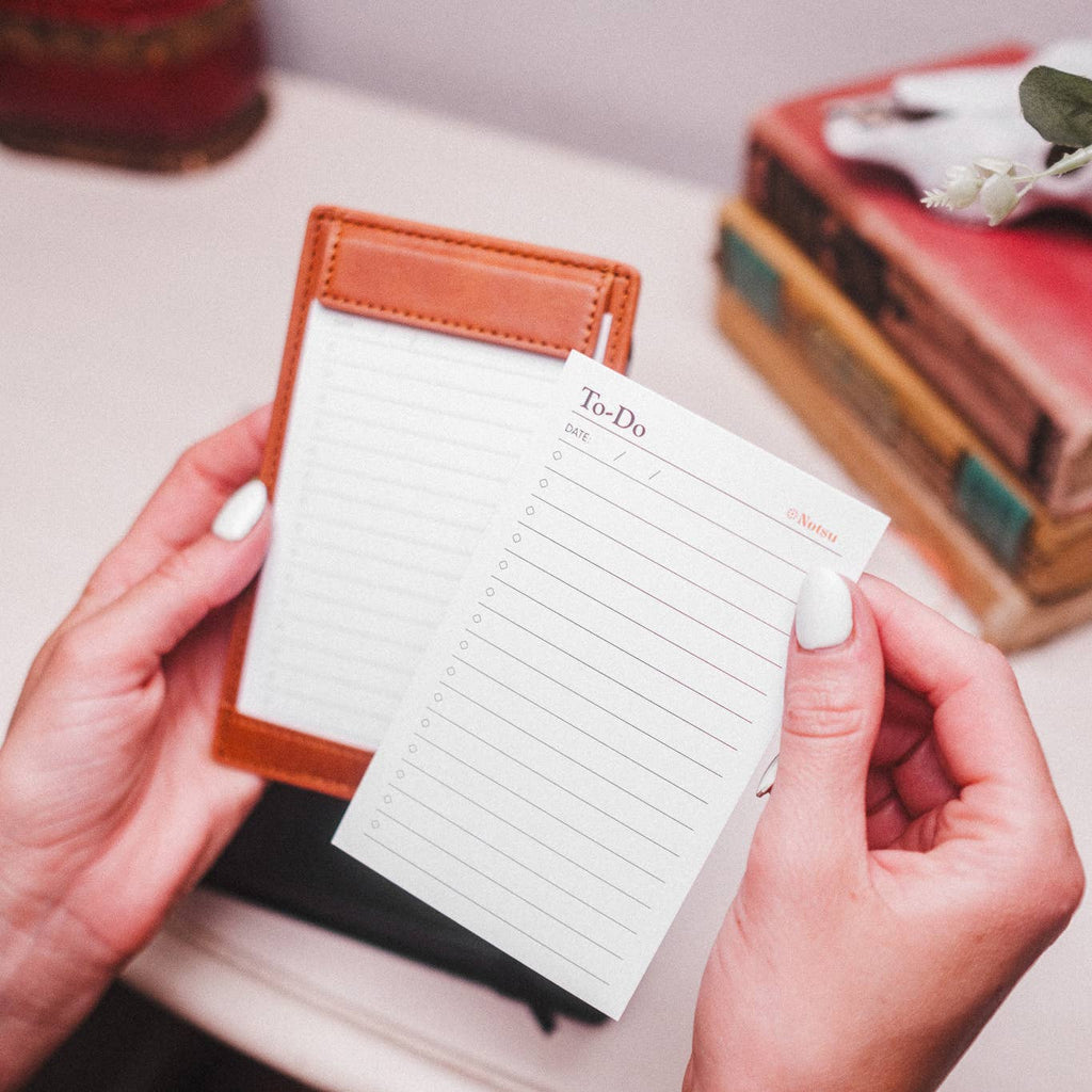 Notsu note card holder showing card storage and pen loop