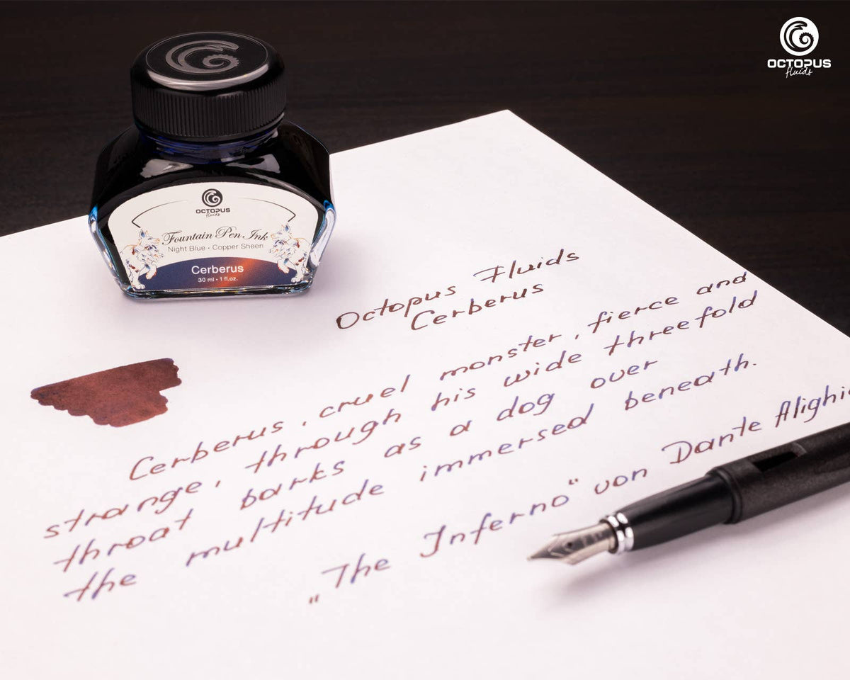 Handwritten passage and ink swatch beside an Octopus Fluids Cerberus 30 mL ink bottle and fountain pen