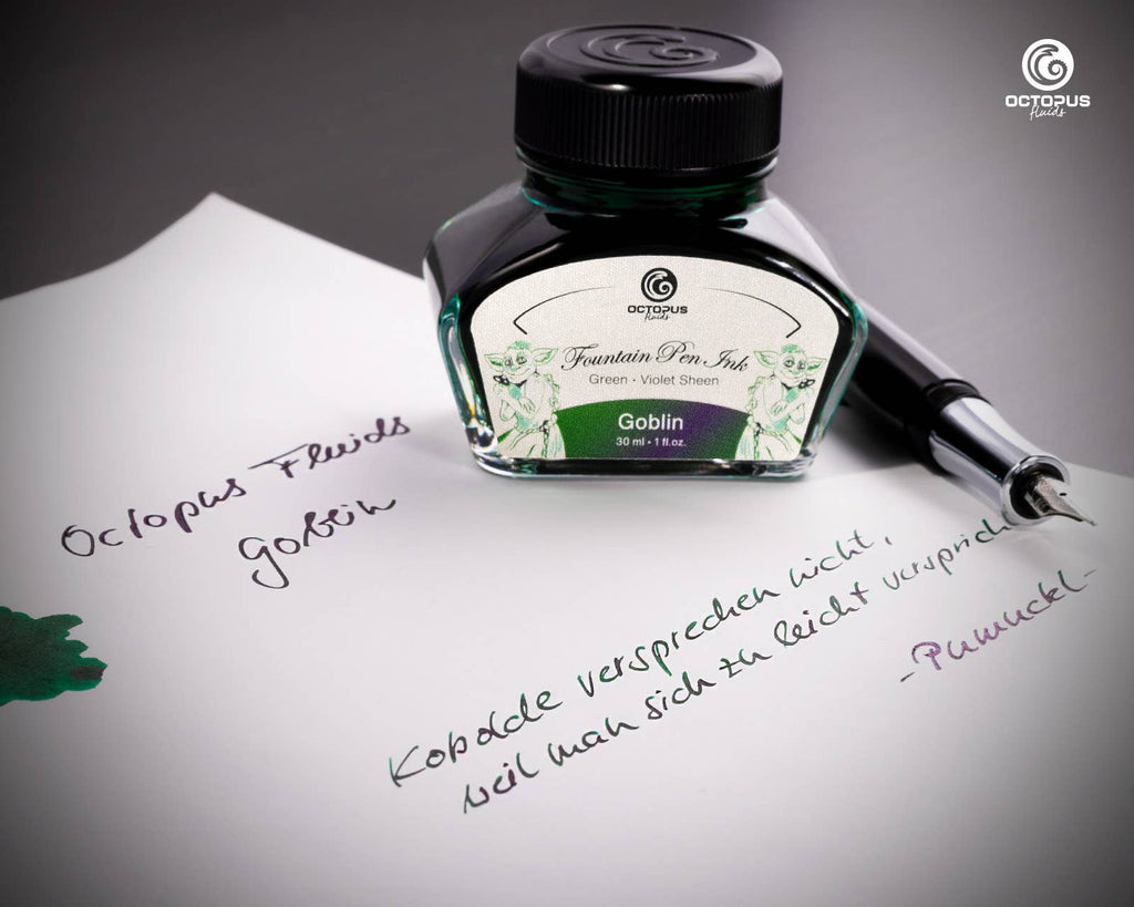 Handwritten passage and ink swatch beside an Octopus Fluids Goblin 30 mL ink bottle and fountain pen