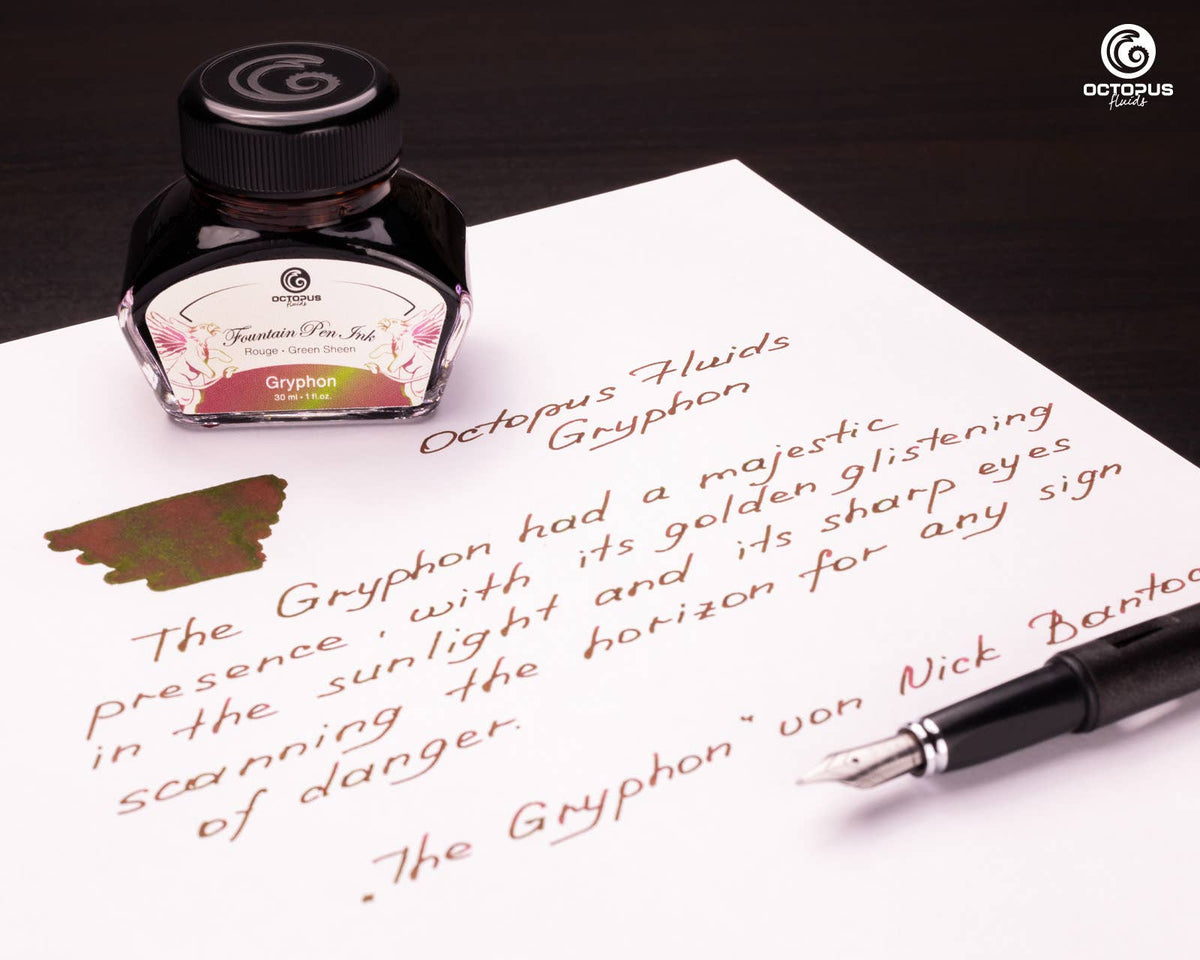 Handwritten passage and ink swatch beside an Octopus Fluids Gryphon 30 mL ink bottle and fountain pen