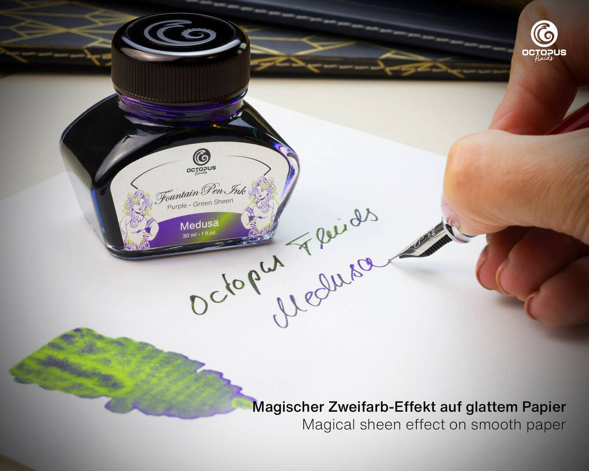 Octopus Fluids Medusa ink bottle beside a fountain pen writing example and ink swatch