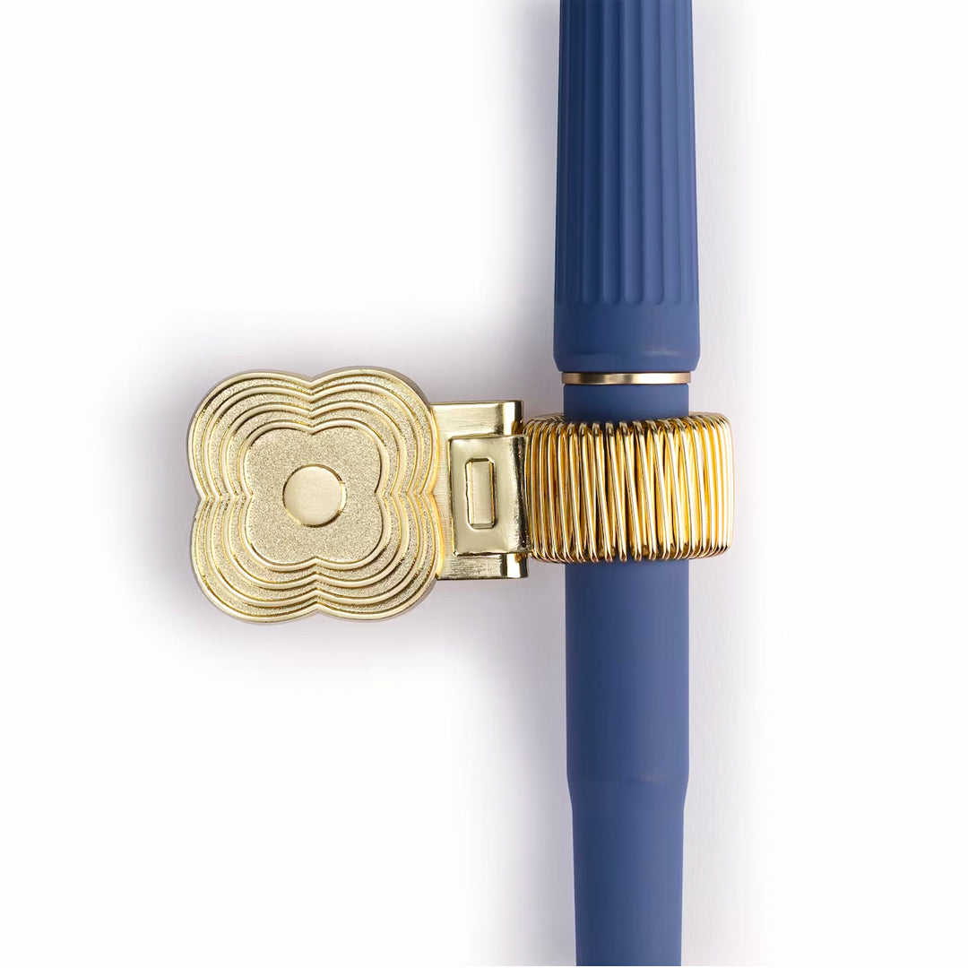 Papier Flower pen clip attached to a notebook