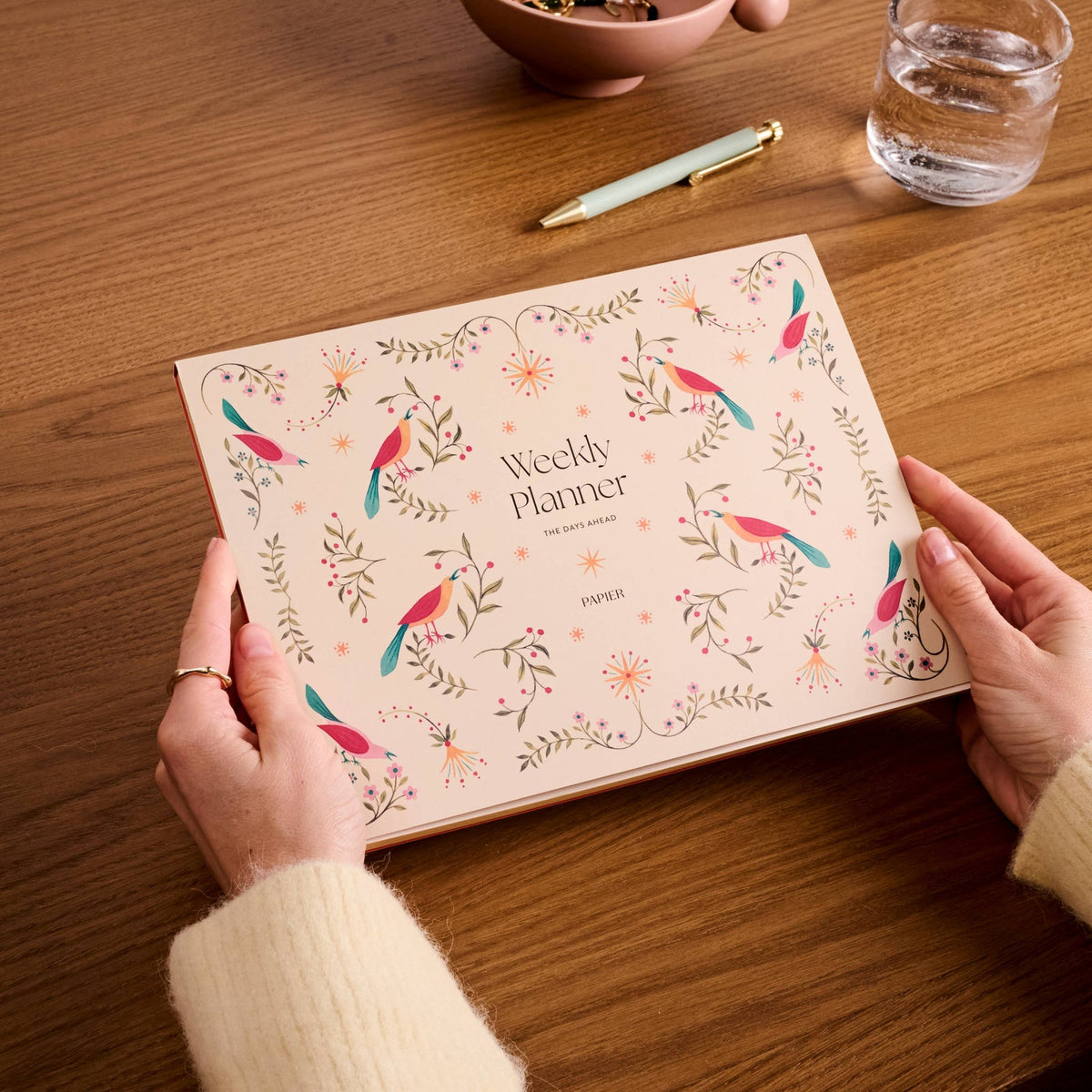 Papier Folklore Birds desk planner shown on a workspace