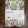 PEPIN Butterflies Gift & Creative Paper Book front cover on a dark wood surface