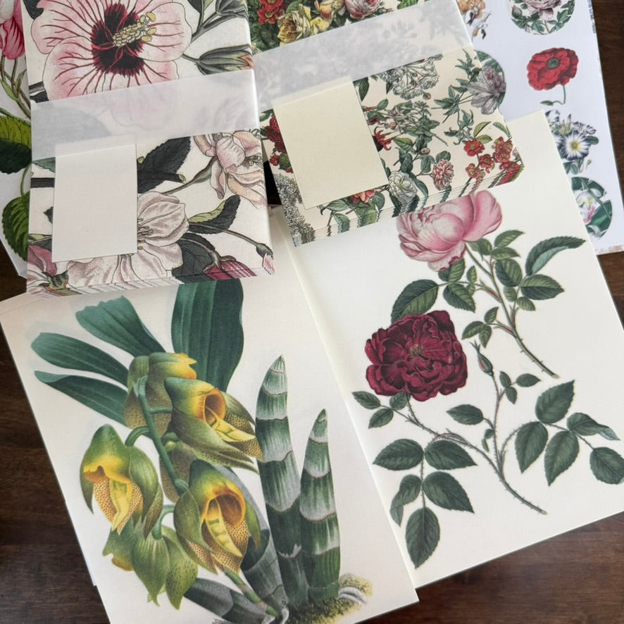 Assorted floral papers, cards, envelopes, and stickers from the PEPIN Flowers Correspondence Set