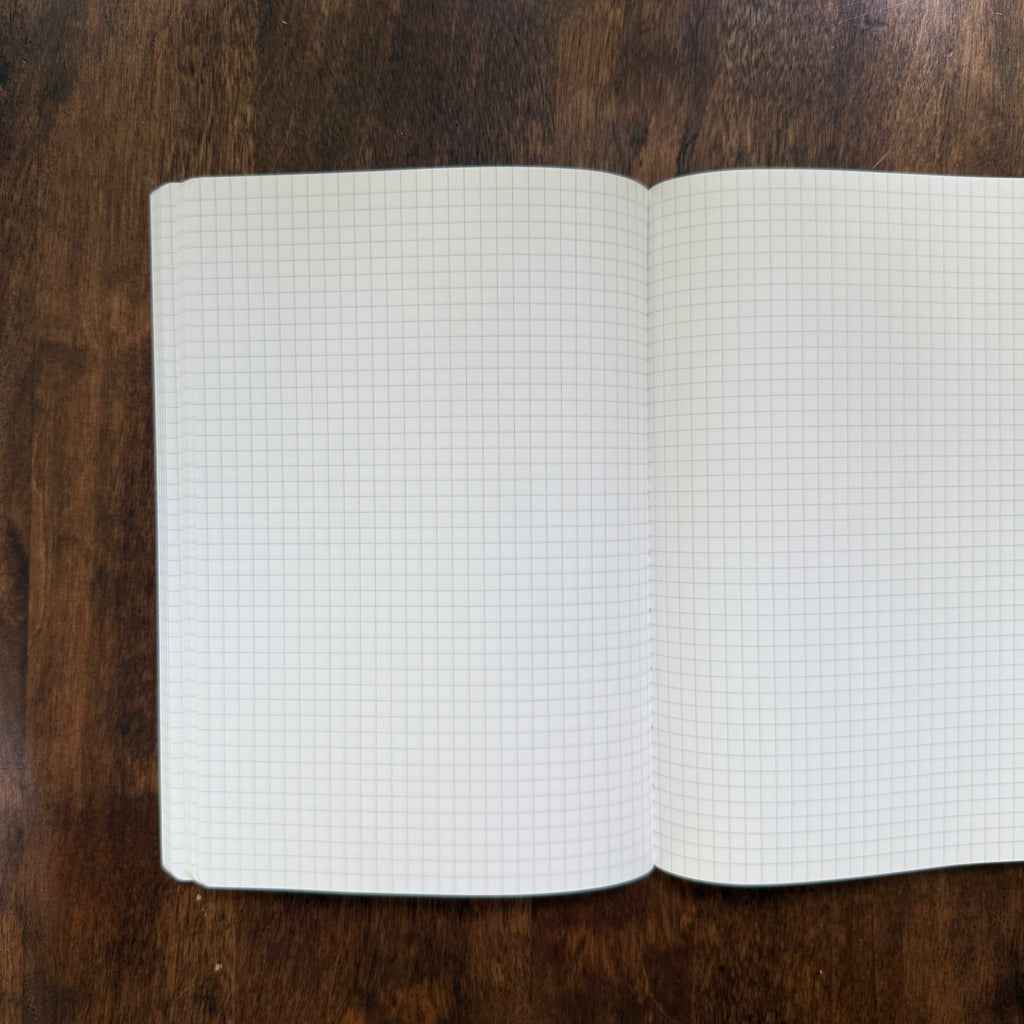 Open PlannerMonkeyCo B6 notebook showing white 52 gsm Tomoe River paper
