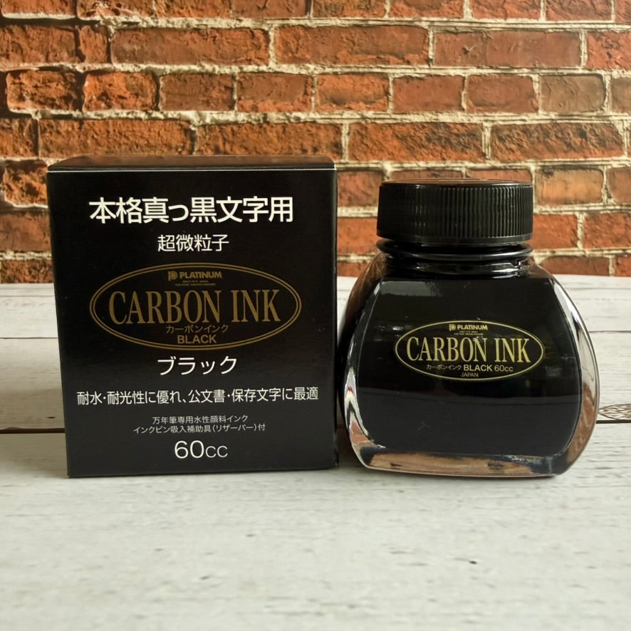 Platinum Carbon Ink Black 60 mL bottle beside its black Japanese retail box