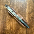 Platinum Preppy Black fountain pen with Fine 03 nib resting on a wooden pen stand