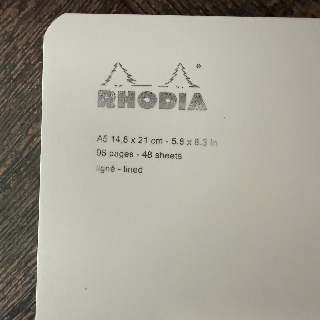 Close-up of Rhodia Ice notebook label showing A5 size, 96 lined pages, and 48 sheets