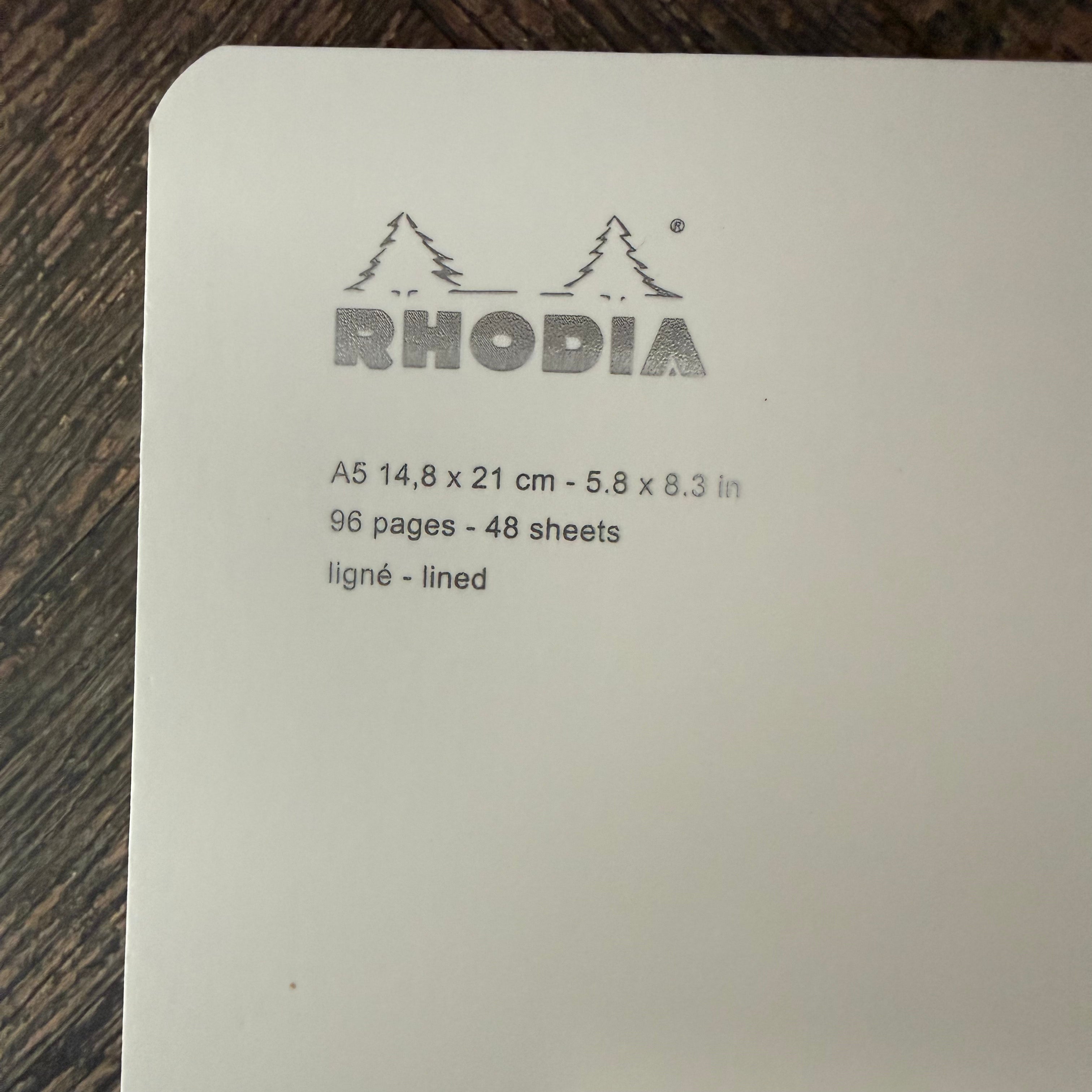 Close-up of Rhodia Ice notebook label showing A5 size, 96 lined pages, and 48 sheets