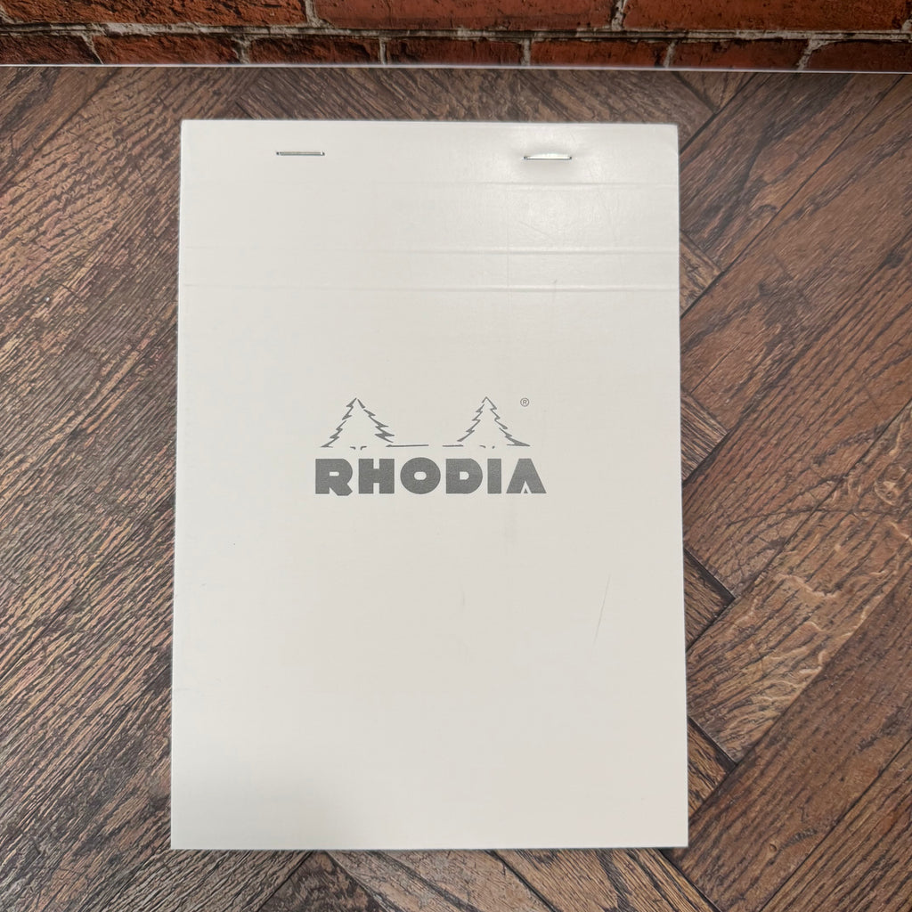 White Rhodia Ice No.16 A5 graph notepad with silver Rhodia logo and top-stapled fold-back cover