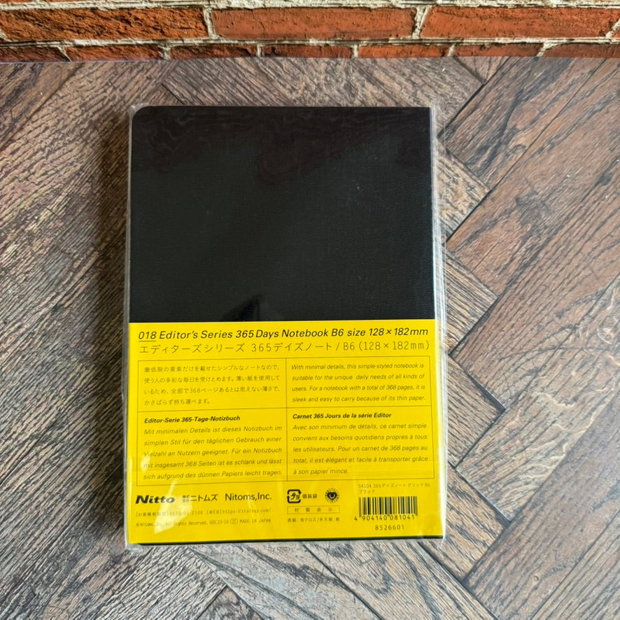 Back of the STALOGY 365Days B6 black notebook with yellow band, made in Japan by Nitto