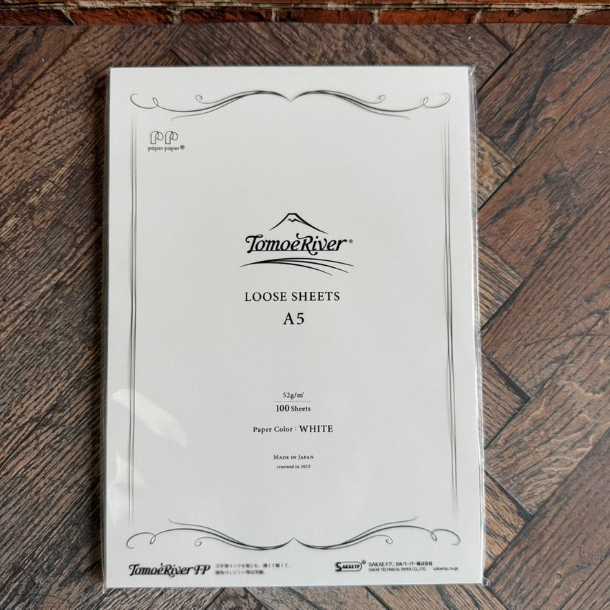 Front of a Tomoe River FP A5 loose sheets pack: 100 white 52 gsm sheets, made in Japan