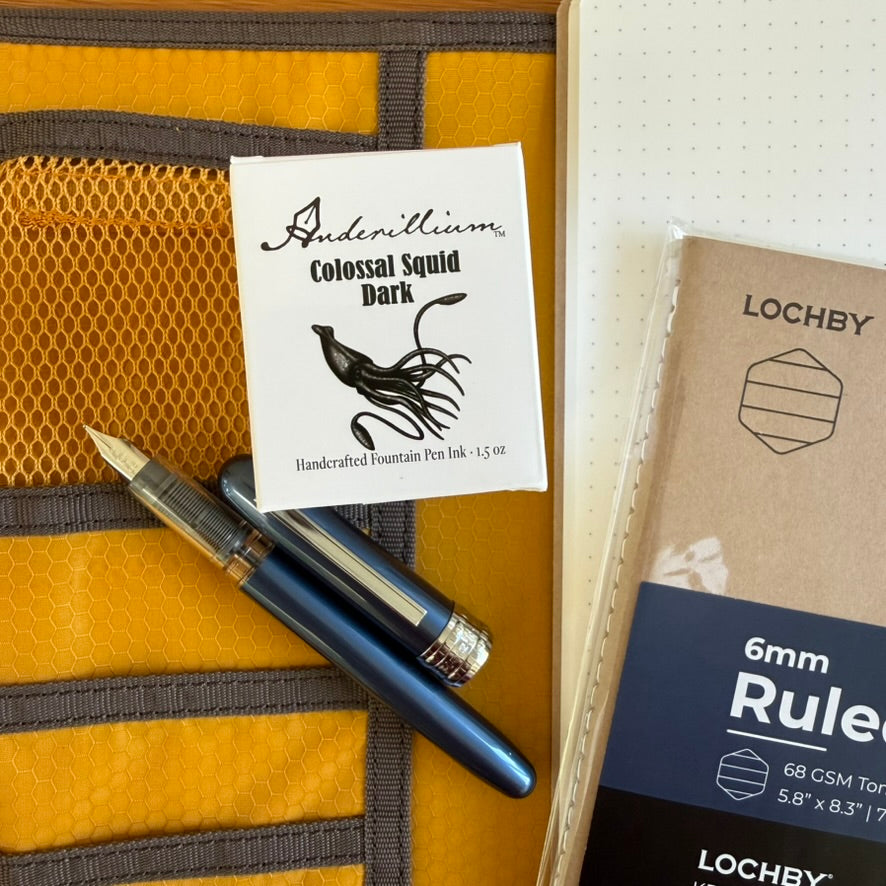 Blue Platinum Plaisir fountain pen with Anderillium Colossal Squid Dark ink and Lochby ruled notebook