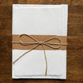 Tri-Art handmade cotton correspondence set with five deckle-edge sheets and matching envelopes tied with kraft paper and twine