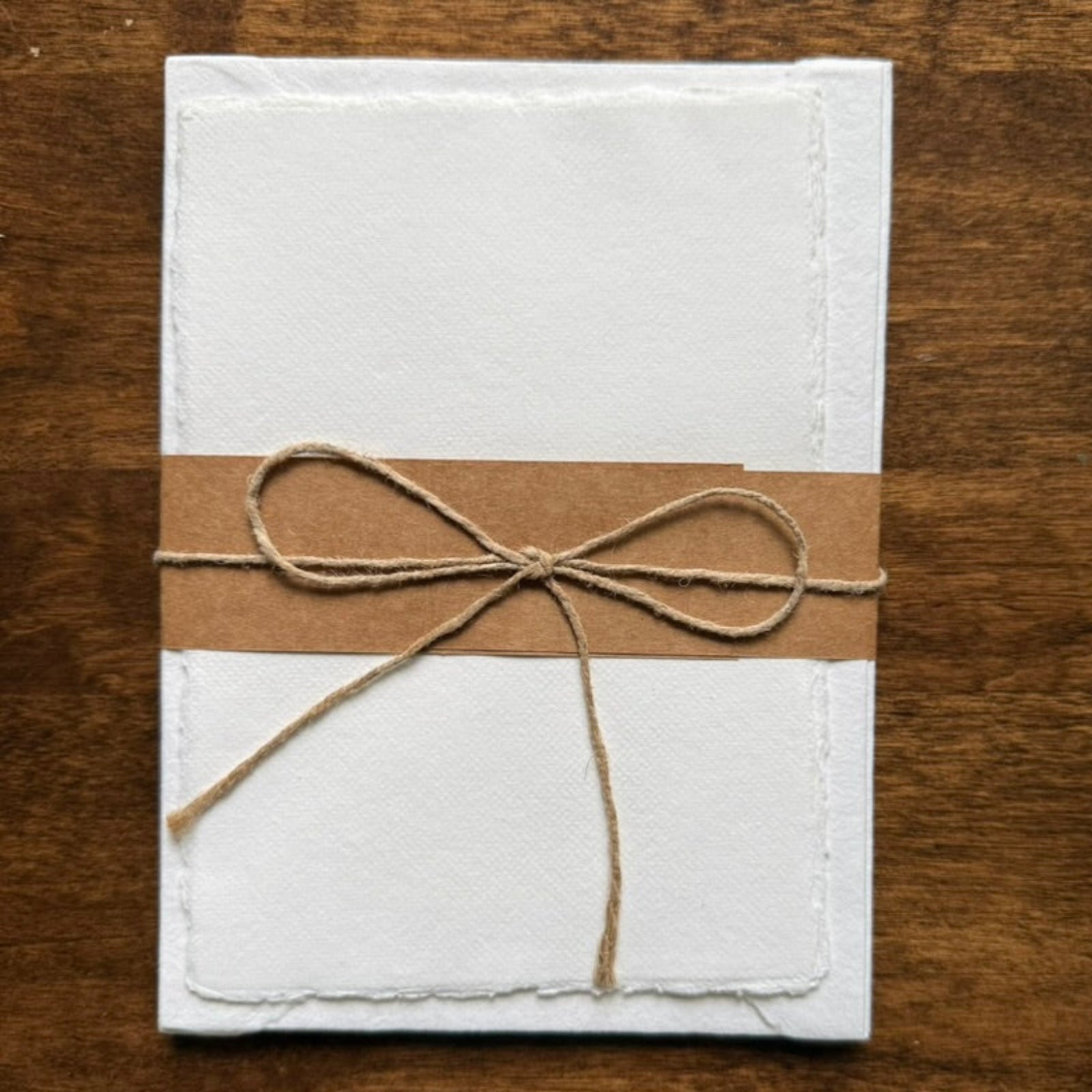 Tri-Art handmade cotton correspondence set with five deckle-edge sheets and matching envelopes tied with kraft paper and twine