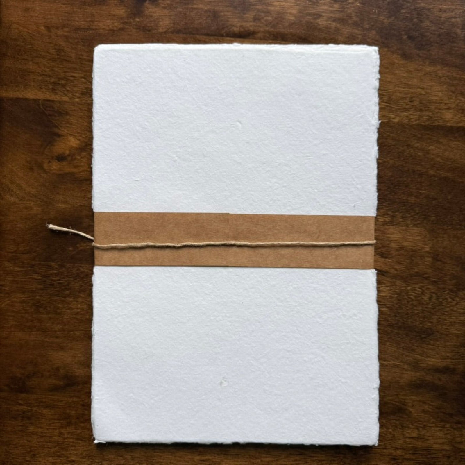 Tri-Art handmade cotton paper pack wrapped with kraft paper and natural twine